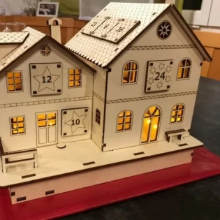 Advent calendar house wooden light house
