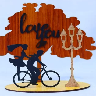 Couple cycling love stand