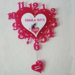 laser cut heart shaped pendulum wall