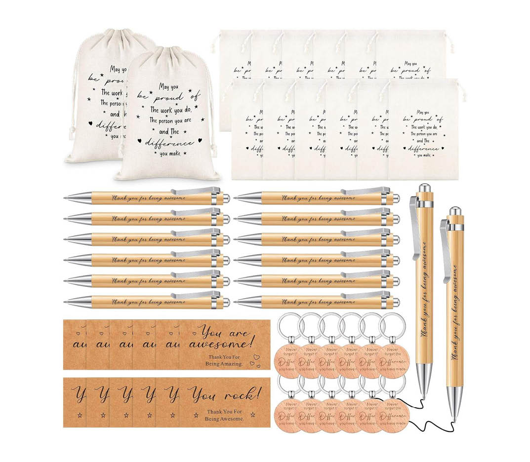 Corporate Notebook, Pen & Keychain Gift Set Corporate notebook, pen and keychain gift set packed in a presentation box for employee and client gifting