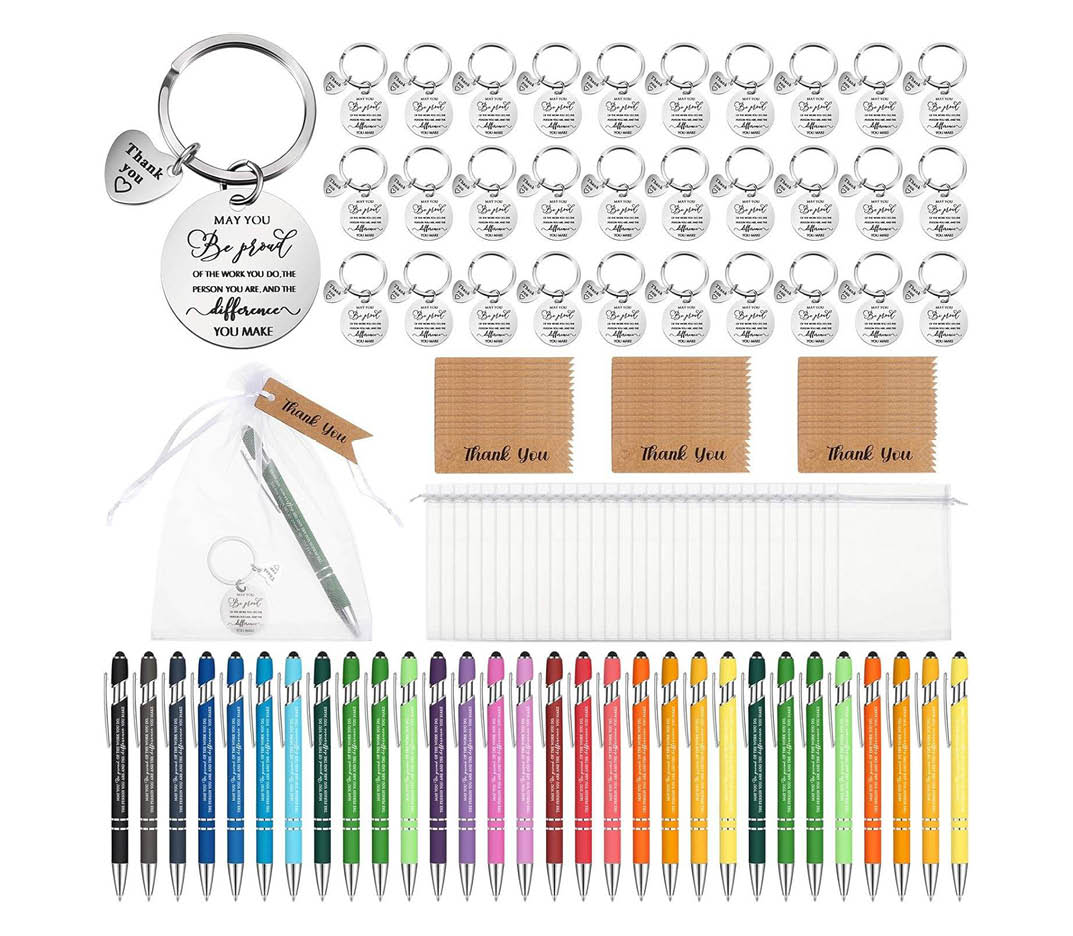 Corporate Notebook, Pen & Keychain Gift Set Corporate notebook, pen and keychain gift set packed in a presentation box for employee and client gifting