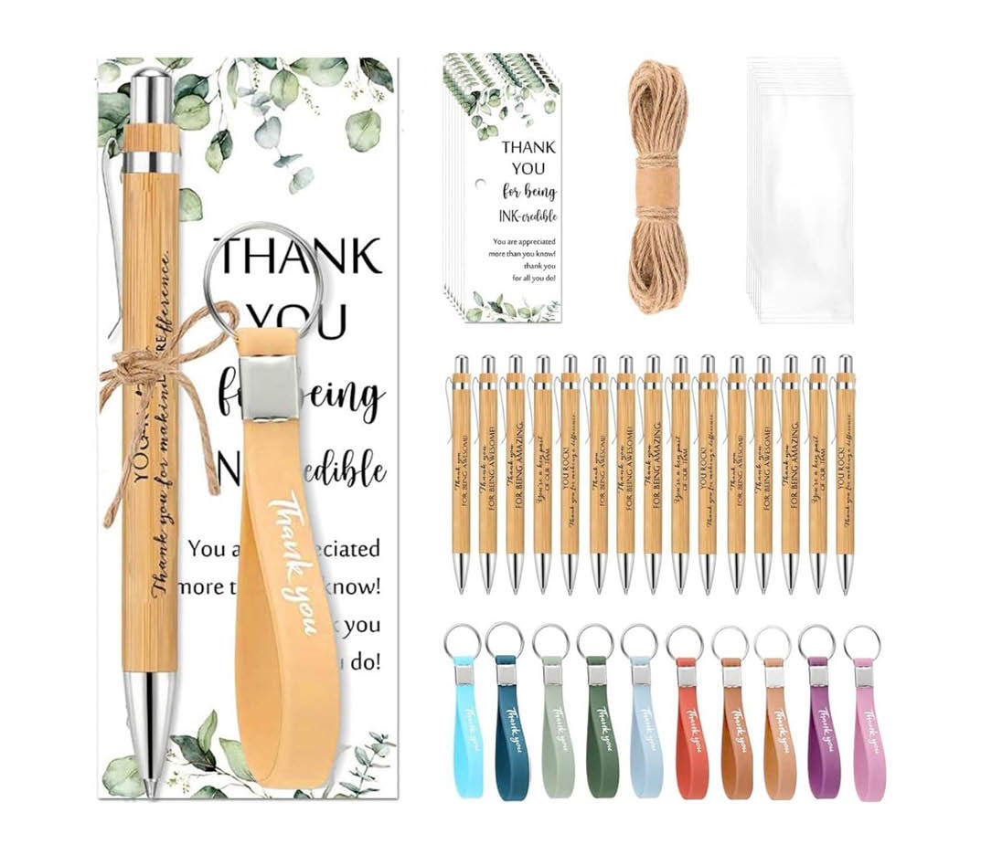 Corporate Notebook, Pen & Keychain Gift Set Corporate notebook, pen and keychain gift set packed in a presentation box for employee and client gifting